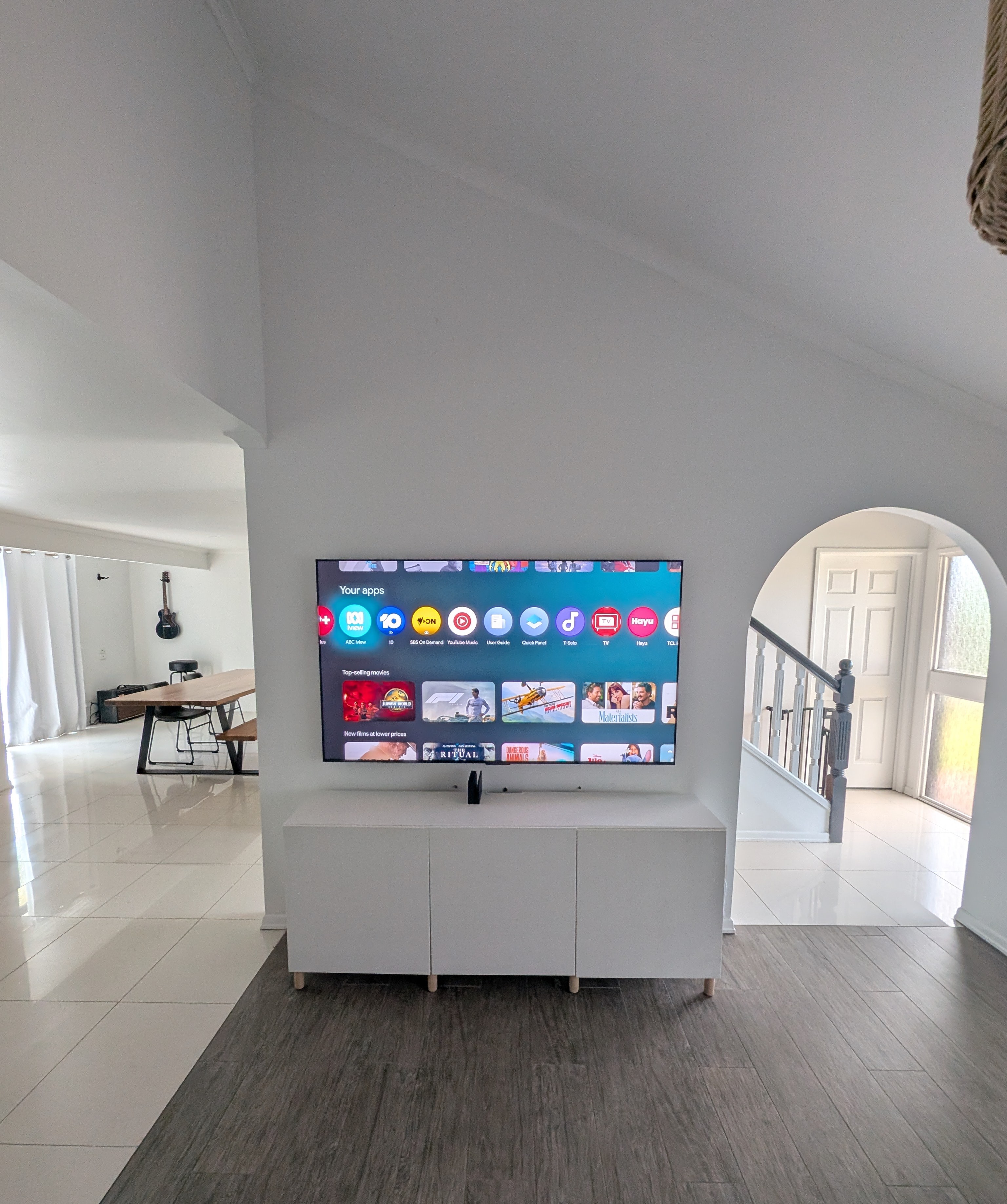 Professionally wall-mounted TV with hidden cables.